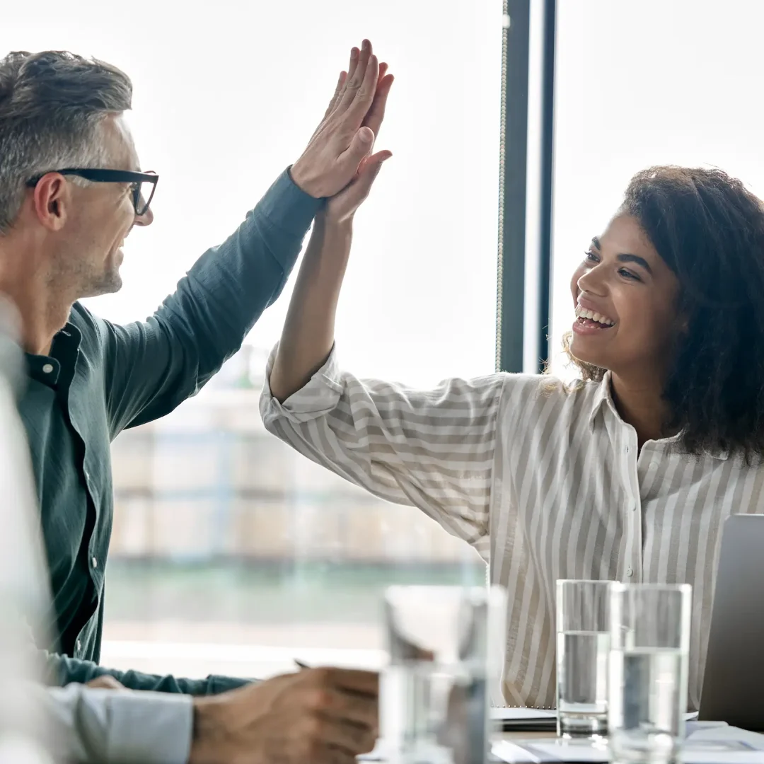 two-happy-international-business-partners-giving-h-2023-11-27-05-03-33-utc two-happy-international-business-partners-giving-h-2023-11-27-05-03-33-utc
